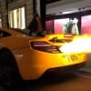Flame spitting Mclaren 12C fries its own bumper