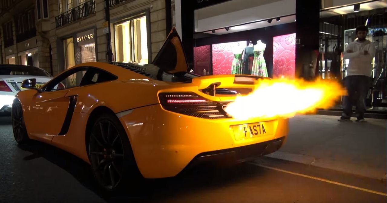 Flame spitting Mclaren 12C fries its own bumper