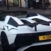 Lord Aleem pulled over in Lamborghini Aventador SV Roadster