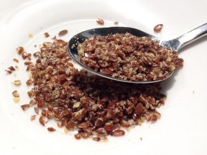 ground flax seeds in spoon